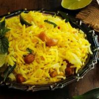 Lemon Rice · basmati rice infused with a zesty lemon sauce seasoned with cumin, red chili, cilantro, curr...