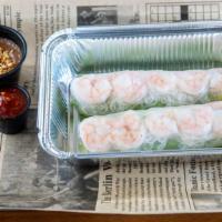 Shrimp Spring Rolls · Favorite. Fresh green leaf lettuce, mints, shrimps, and vermicelli roll with rice paper. Ser...