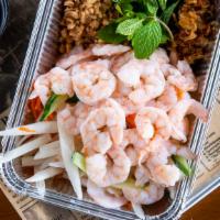 Lotus Shrimp Salad · Lotus roots mixed with Thai mints, shrimps, peanut, and sauce. Choice of spicy or non-spicy.