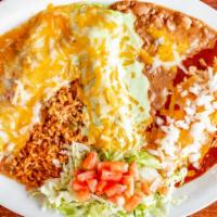 Enchiladas Caseras · 3 enchiladas, cheese and onion, shredded chicken and shredded beef smothered with our jalape...