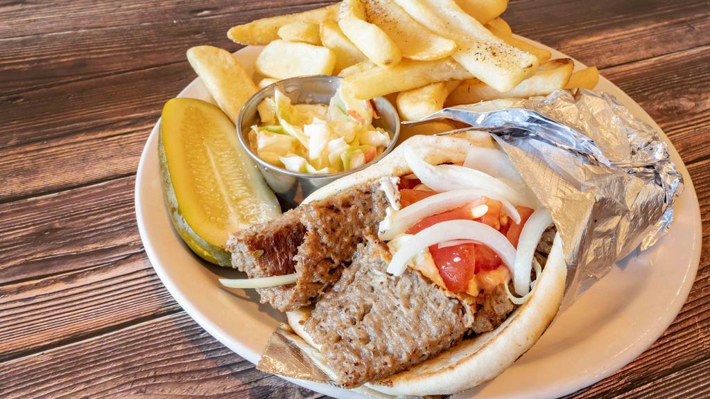 Gyro Sandwich · Gyro meat, onions, tomatoes, and tzatziki sauce served in a pita.