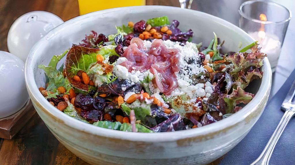 Farmers Green Salad* · Vegetarian, gluten-free. Champagne vinaigrette, cranberries, goat cheese, pickled shallots, spiced pine nuts.