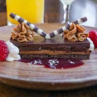 Chocolate Tart* · Gluten-free. Dulce de leche, berries.