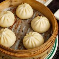 Steamed Bao · 5 pieces. Pork with Chinese cabbage or beef with onion.