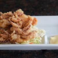 Squid Tempura
 · Pescatarian. Our new lightly battered tempura squid tentacles. These savory squid paired wit...