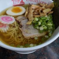 Tampopo Shouyu
 · A classic Tokyo Shouyu ramen in our daily-made chicken broth. Served with wavy egg noodles, ...