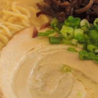 Shouyu Tonkotsu
 · The best of both worlds, a combination of our pork and chicken broths. Served with wavy egg ...