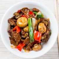 Mongolian Beef · Spicy (🌶) Sliced tenderloin beef stir-fried with green scallions and onions in a flavorful ...