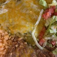 Enchiladas Plate · Choose between cheese, chicken, and beef. served with beans and rice.