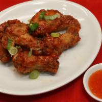 Cánh Gà Chiên - Vietnamese Chicken Wings (7 Ea) · Deep fried chicken wings tossed in sweet chili sauce.