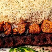 Mix  Shami Kabob · chicken cubes with ground lamb skewers Basmati rice and Salad.