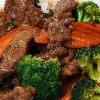 Beef And Broccoli · Garlic soy sauce with carrots and broccoli.