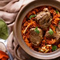 Lamb Biryani · Marinated lamb prepared with a blend of spices and mixed with rice.