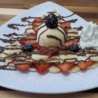 The Love Crepe · Bananas, Strawberries, and Nutella inside; Bananas, Strawberries, Blackberries, Blueberries,...