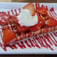 Strawberry Sugar Waffle · Strawberry & powder sugar.
Whipped cream not served To Go.