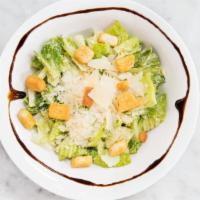 The Caesar Salad · Romaine lettuce, parmigiano reggiano, croutons, and caesar dressing.