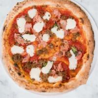 The Meats Pizza · Italian tomato sauce, fresh mozzarella, housemade angus beef meatballs, pepperoni, and  rose...
