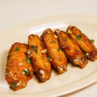 Hong Kong Wings - Garlic & Soy Sauce (5 Pcs) · A savory combination of garlic, pepper, and soy sauce