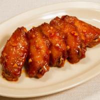 Hong Kong Wings - Spicy Sauce (5 Pcs) · Crispy wings covered in mouth-watering sweet & spicy sauce