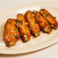 Hong Kong Wings - Garlic & Soy Sauce (10 Pcs) · A savory combination of garlic, pepper, and soy sauce