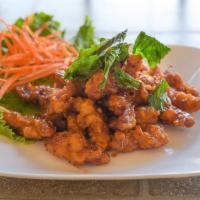 Crispy Garlic Chicken · Deep fried battered chicken, stir-fried in house special chili garlic sauce topped with cris...