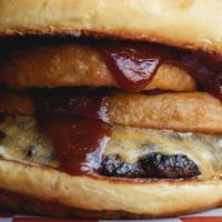 Pendleton · One-quarter pound Painted Hills grass-fed beef, onion rings, Tillamook cheddar, bbq sauce, m...