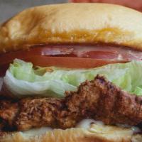 Cap Hill Fried Chicken Sandwich · Buttermilk fried natural chicken breast, tomato slices, lettuce, mayo.