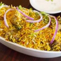 Paradise Special Chicken Biryani · Basmati Rice cooked with chicken cooked along with House special herbs and spices.