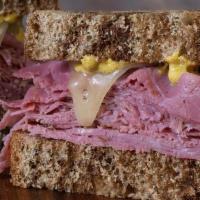 I Love New York · Double portions of pastrami and corned beef, swiss, spicy mustard or russian dressing, on sl...