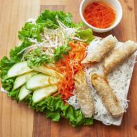 Cha Gio · 4 pieces. Pork and shrimp egg rolls with vermicelli noodles and vegetables.
