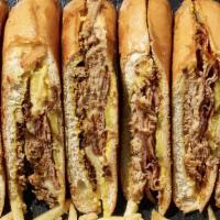 Cuban Sandwich · Slow Roasted Mojo Pork, Swiss Cheese, Smoked Ham, Mustard, Hoagie Roll, French FRies