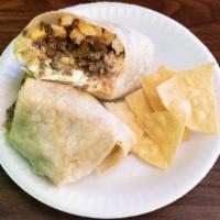 Ultimate Cali Burrito · Choice of meat, Beans, Cheese, French Fries, Guacamole, Pico De Gallo and Sour Cream.