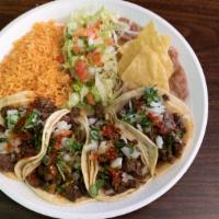 4 Soft Tacos W/Rice And Beans Plate · 4 soft tacos, choice of meat, onions, cilantro and salsa. Includes rice, beans, lettuce, tom...