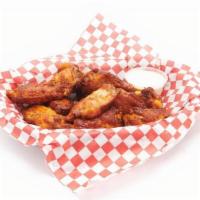 Buffalo Hot Wings · Bone in wings smothered in your choice of buffalo, blazing buffalo, BBQ or spicy BBQ sauce, ...