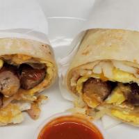 Breakfast Burrito · Comes with two eggs, hash browns, and your choice of meat.