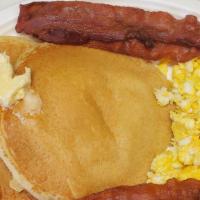 Pancake Plate · Two pancakes, two sausage links, two pieces of bacon, two eggs.