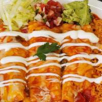 Rolled Wet Tacos (Enchiladas) · Three corn tortillas with your choice of filling, and topped with enchilada sauce, cheese, a...