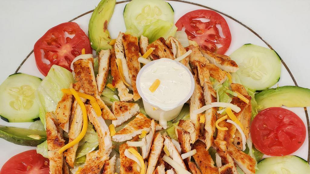 Chicken Salad · Salad served with chicken and a side of ranch.