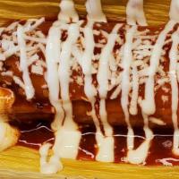 Chicken Tamale · Comes with tomato sauce and sour cream on top