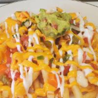 Cheese Fries · Fries topped with nacho cheese, pico de gallo, sour cream, guacamole, and jalapeños.