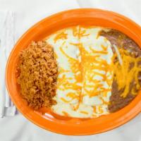 Enchiladas A La Crema · Enchiladas smothered with a rich, decadent cream sauce and cheddar cheese. Tastes best with ...
