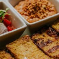 Kati Satay · Grilled marinated tofu cubes on skewers, served with Kati’s own hand-roasted peanut sauce. (...