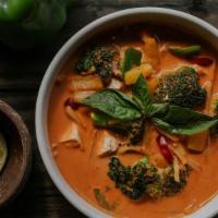 Red Curry · Red chili curry with bamboo shoots, basil, broccoli, pineapple, and bell peppers. (GF) (Rice...