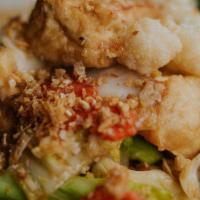 Pad Pak · Broccoli, cauliflower, napa cabbage, collard greens, and carrots stir-fried in mild garlic s...