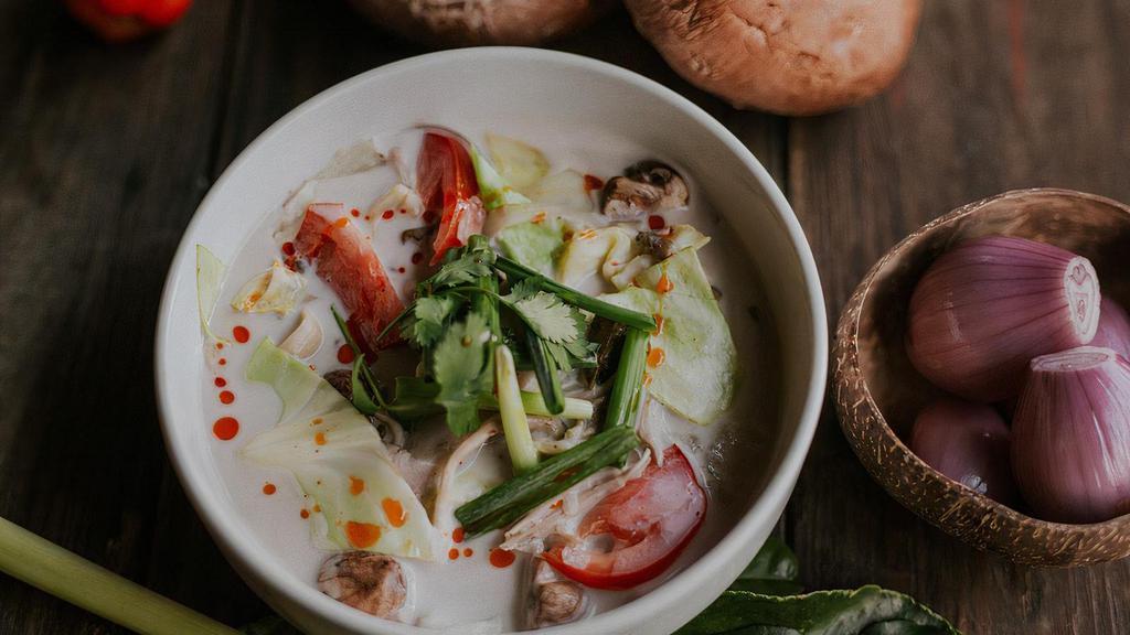 Tom Kha With Artichoke Hearts · Fragrant coconut milk-based herbal soup. A blend of lemongrass, kaffir lime leaves, galangal root, artichoke hearts, and mushrooms. (GF)