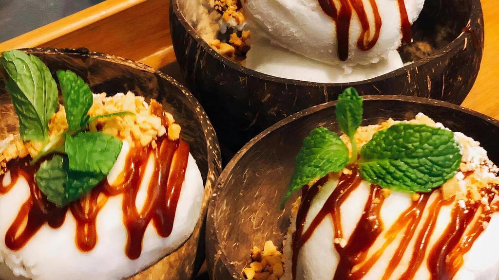 Coconut Ice Cream · Made from fresh coconut cream. Topped with crushed peanuts and homemade Kati caramel. (GF)
**Please note: Ice cream melts! We recommend this item for dine in or pickup orders only.**
