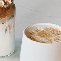 Caramel Macchiato · Espresso shots poured over milk with vanilla syrup. Topped with a generous drizzle of carame...