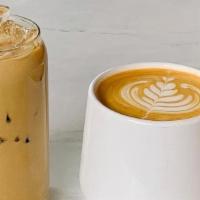 Golden Latte · A fun twist on a traditional latte. Shots of espresso and steamed milk combined with turmeri...