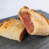 Strawberry Rhubarb Pastie · Perfectly flaky crust filled with a generous portion of rhubarb, strawberries and a hint of ...
