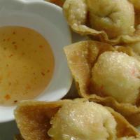 Crab Wonton · Crispy wontons, stuffed with crab meat and cream cheese served with plum sauce.